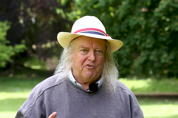 Phil Harding giving a lecture to camera outside