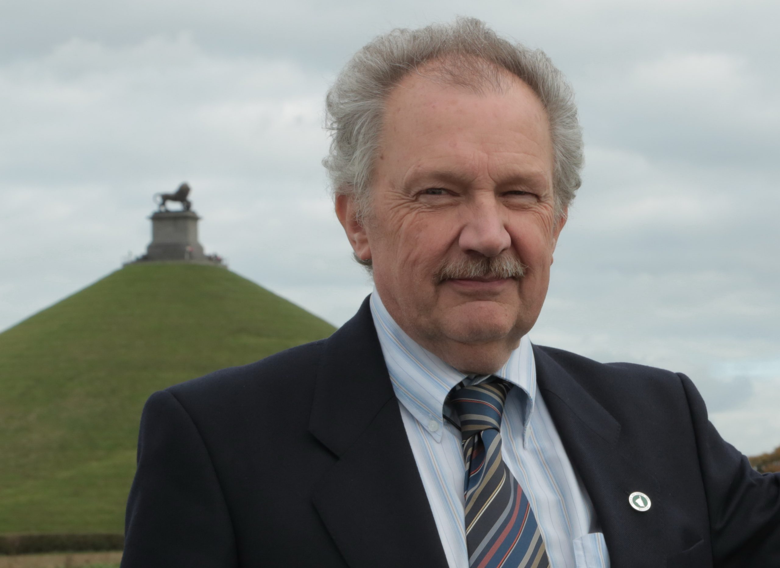 An image of Alain Lacroix next to the Lion's Mound